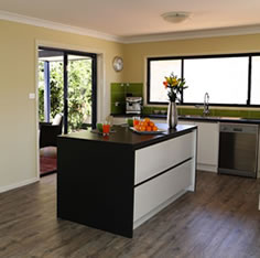 The interior and kitchen in a transportable home in NSW