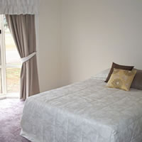 A bedroom inside a transportable home in NSW